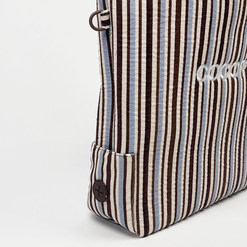 Brown, white and blue striped Tote Bag with poop bag dispenser and D-Ring on side.