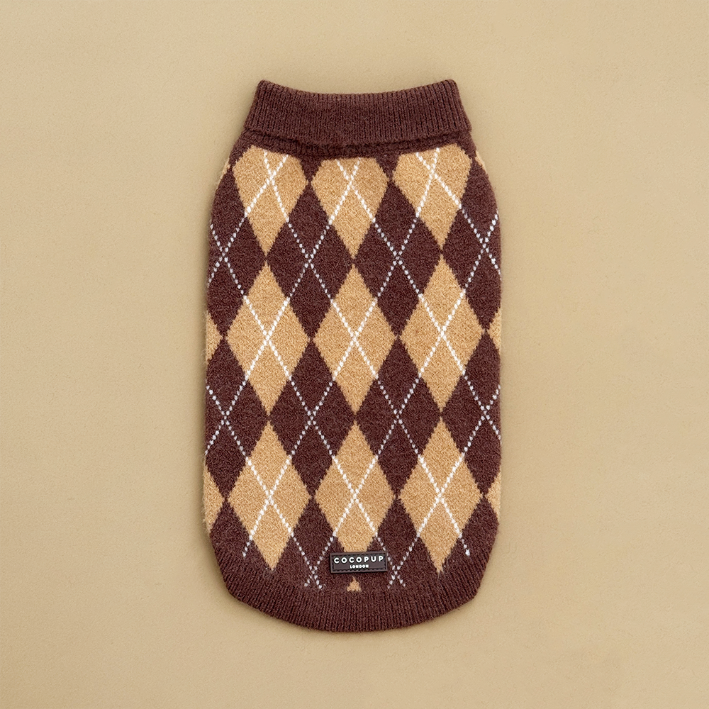 Dog jumper in a brown, tan, and white argyle pattern. 