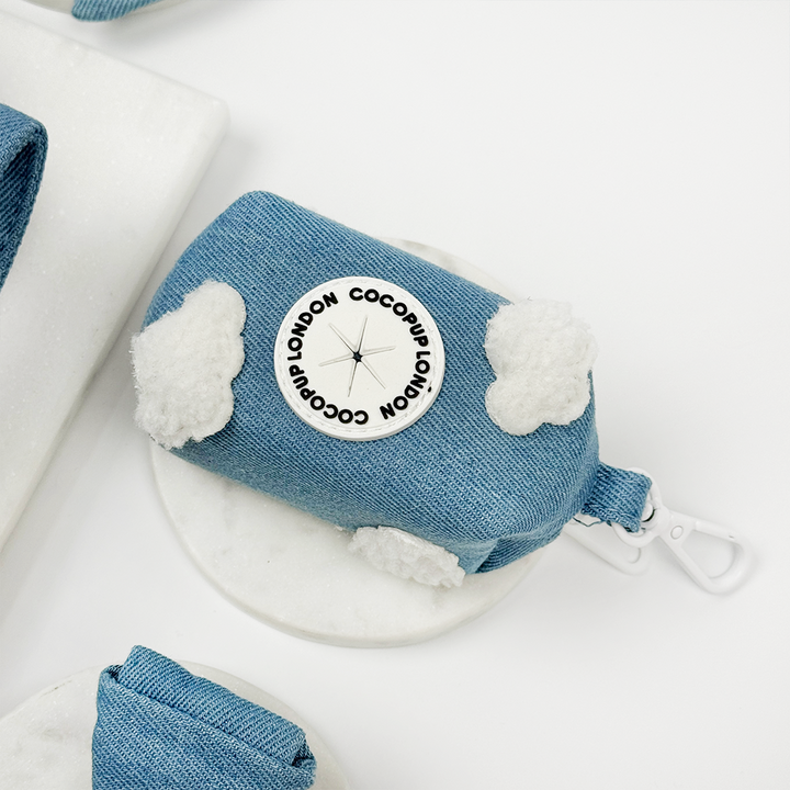 Blue Denim Poop Bag Holder with white fluffy clouds. 