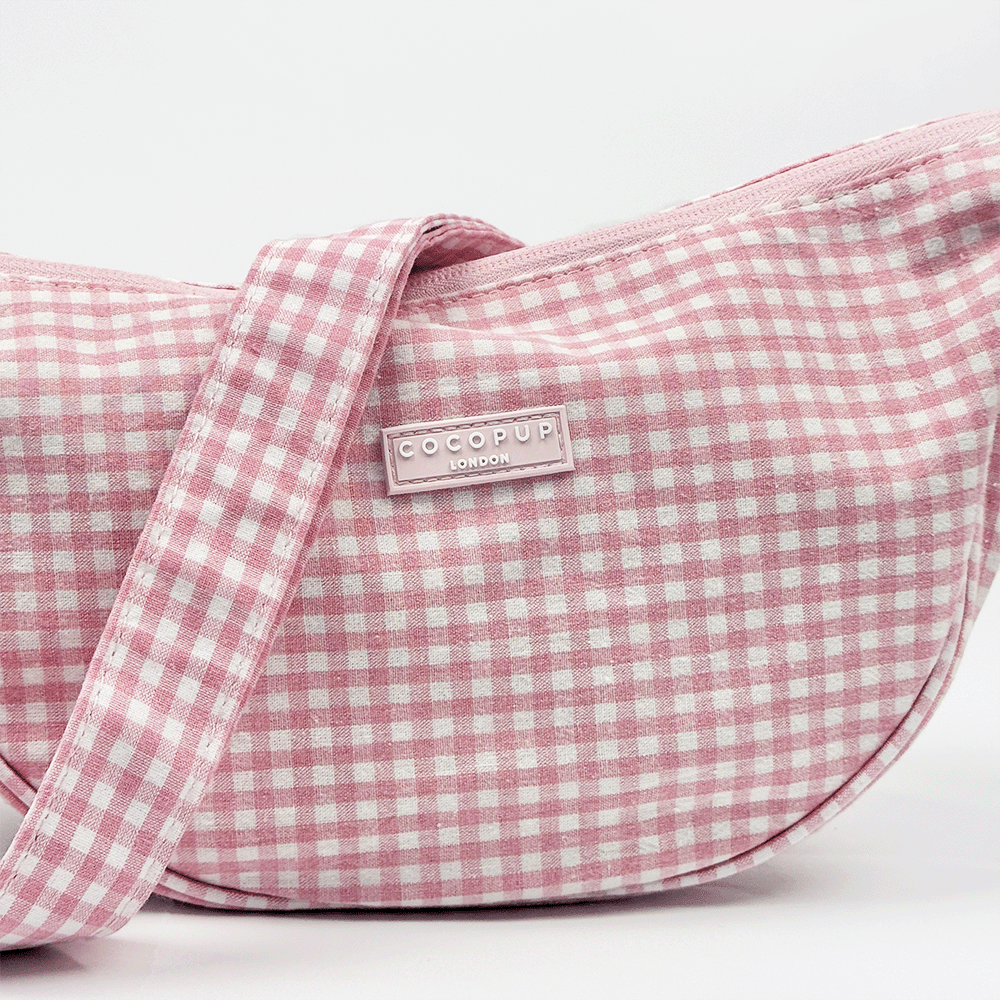 Pink and white gingham check design bag with matching strap.