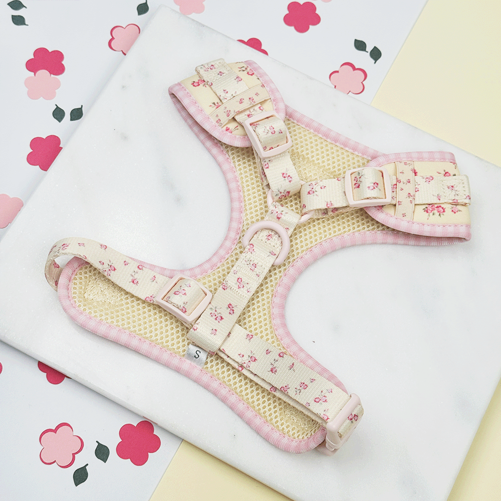Floral Dog Harness with yellow background and pink flowers.