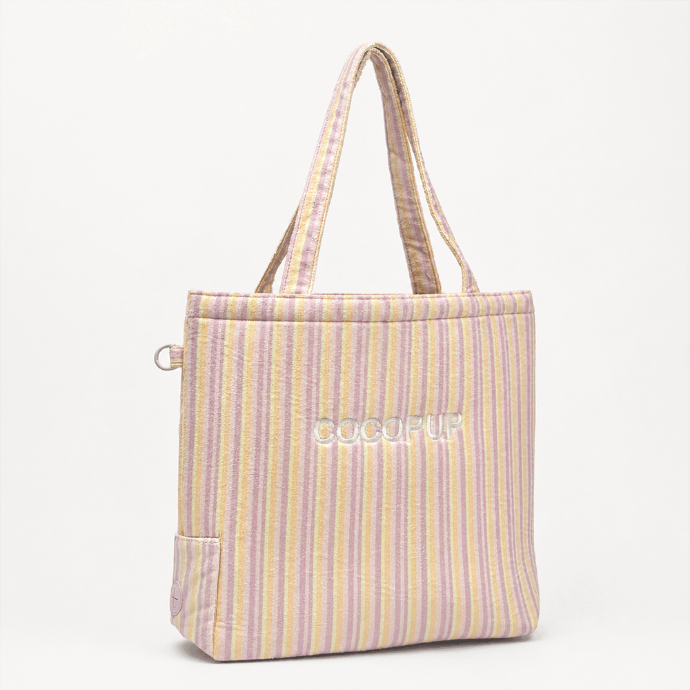 Pink, yellow and orange striped Tote Bag with poop bag dispenser and D-Ring on side.