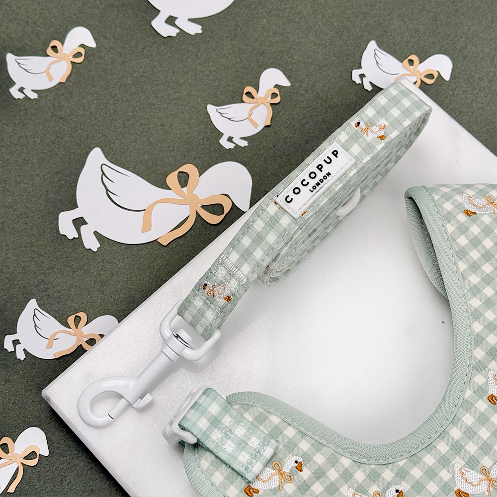 Green and white check print dog lead with embroidered geese design.