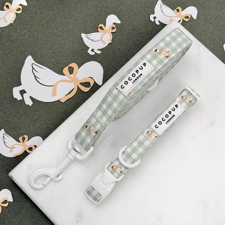 Green and white check print dog lead and collar with embroidered geese design.