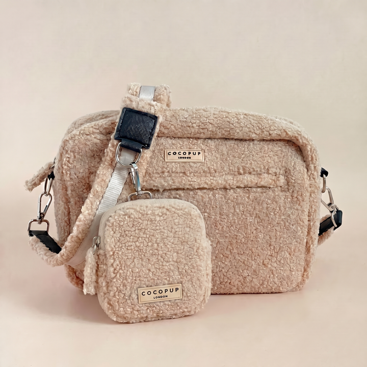 Beige textured Cocopup London Teddy Rupert dog walking bag with matching treat pouch on a neutral background.